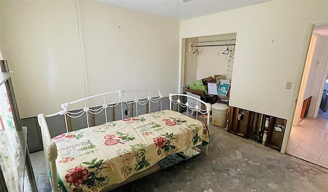 bedroom with concrete flooring