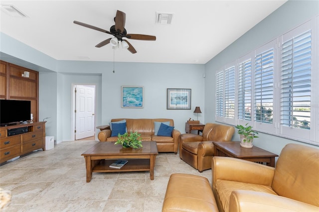 living room featuring ceiling fan