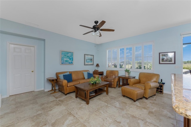 living room with ceiling fan