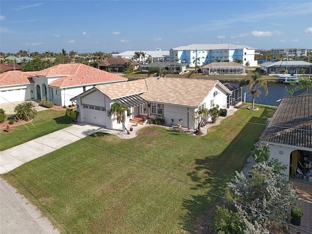 drone / aerial view with a water view