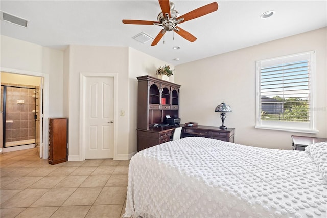 tiled bedroom with ceiling fan and ensuite bathroom