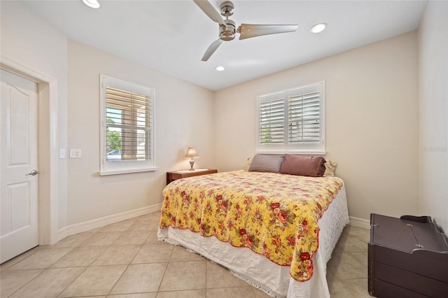 bedroom featuring ceiling fan and light tile patterned floors