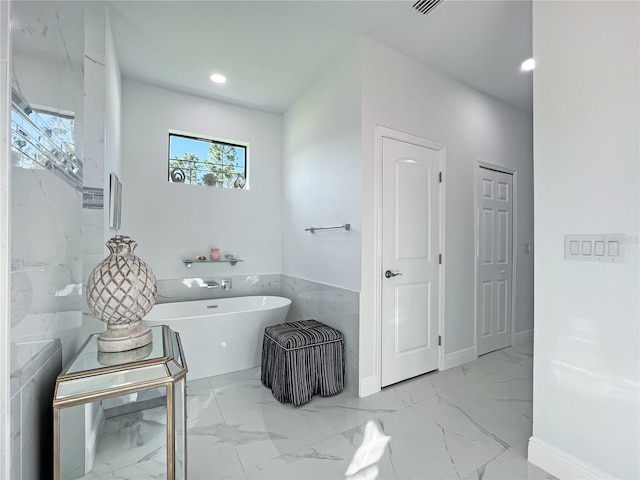 bathroom featuring a bathtub