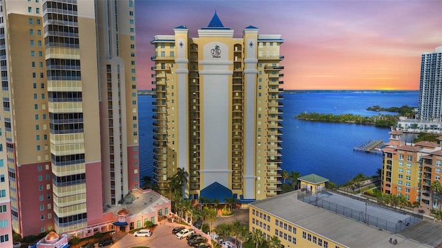 outdoor building at dusk with a water view