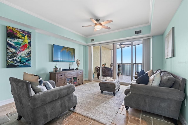 living room featuring crown molding and ceiling fan