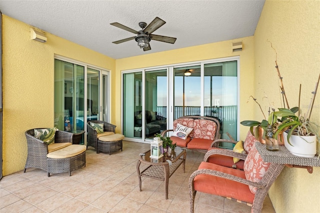 view of patio / terrace featuring outdoor lounge area and ceiling fan