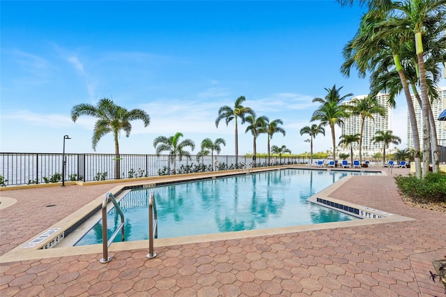 view of pool featuring a patio area