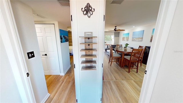 hallway featuring light hardwood / wood-style flooring