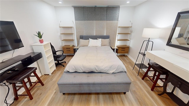 bedroom featuring light hardwood / wood-style floors