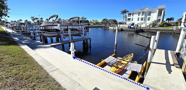 dock area with a water view