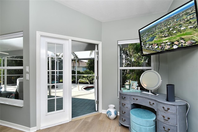 doorway to outside featuring light hardwood / wood-style flooring