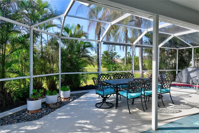 view of patio with a lanai