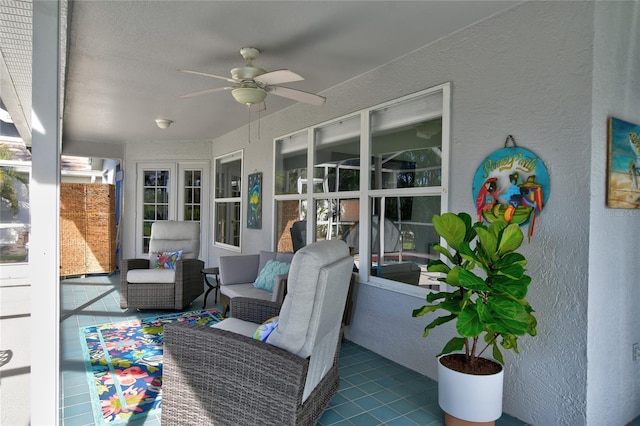 view of patio / terrace featuring ceiling fan