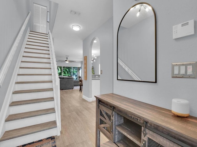 interior space featuring ceiling fan and wood-type flooring