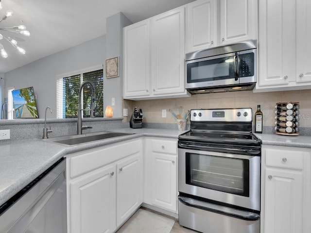 kitchen with white cabinets and stainless steel appliances