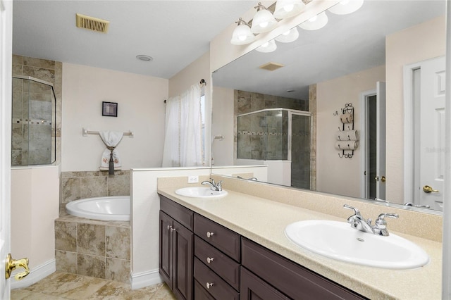 bathroom with separate shower and tub and vanity