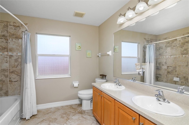 full bathroom with vanity, shower / bathtub combination with curtain, and toilet