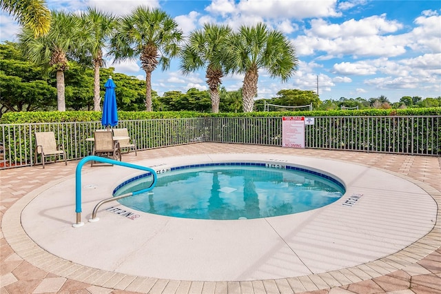 view of swimming pool with a patio