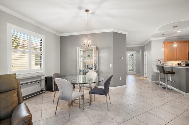 dining space featuring crown molding, light tile patterned floors, and an inviting chandelier