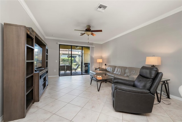 tiled living room with ceiling fan and crown molding