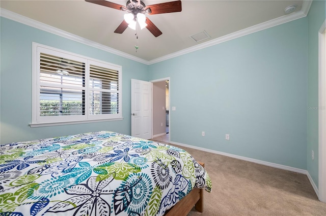 bedroom featuring ceiling fan, light colored carpet, and ornamental molding