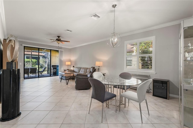 dining room with light tile patterned floors, visible vents, crown molding, and ceiling fan with notable chandelier