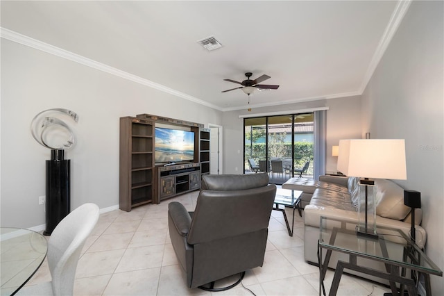 living room featuring ornamental molding, visible vents, ceiling fan, and light tile patterned floors