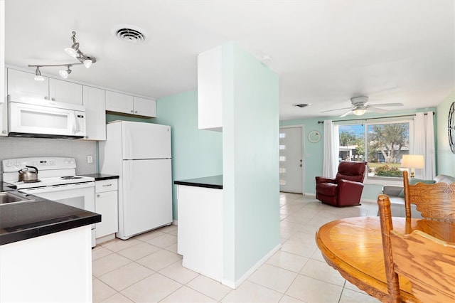 kitchen featuring white cabinetry, light tile patterned floors, white appliances, and ceiling fan