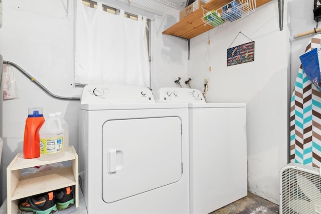 clothes washing area featuring washing machine and dryer