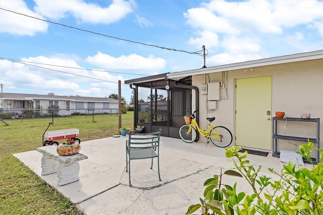 view of patio / terrace with a sunroom