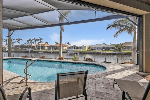 view of swimming pool with a lanai, a water view, and a patio