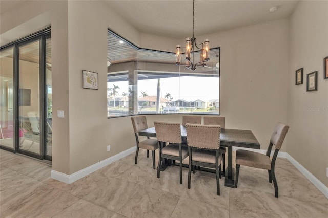 dining area with a notable chandelier