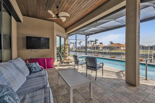 view of patio / terrace featuring ceiling fan, a lanai, and an outdoor hangout area