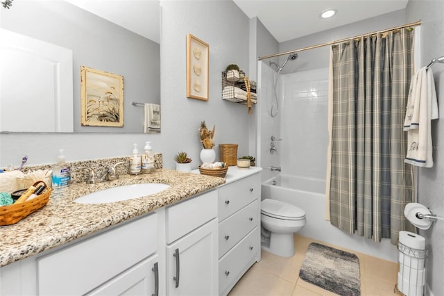 full bathroom featuring tile patterned floors, vanity, toilet, and shower / tub combo with curtain