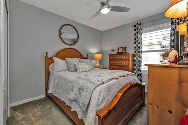 carpeted bedroom featuring a closet and ceiling fan