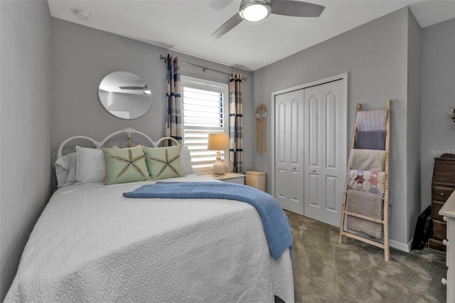 bedroom with dark carpet, a closet, and ceiling fan