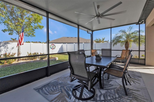 sunroom / solarium with ceiling fan