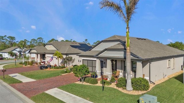 view of front of house with a front lawn and a porch