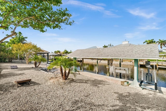 dock area with a water view