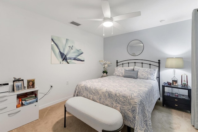 14070 Heritage Landing Blvd Unit 423, Punta Gorda, FL 33955 - bedroom with light carpet and ceiling fan