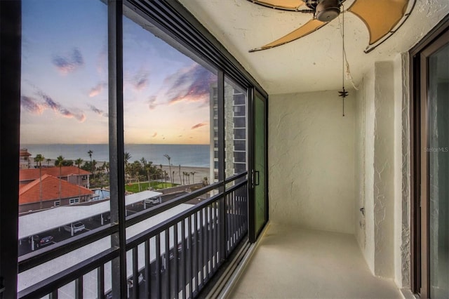 balcony at dusk with a water view