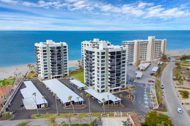 drone / aerial view with a view of the beach and a water view