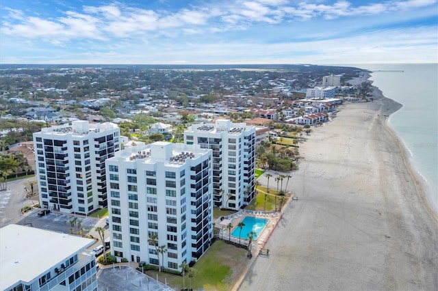 drone / aerial view with a view of the beach and a water view