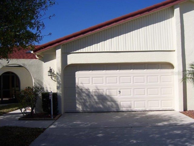 exterior space with a garage