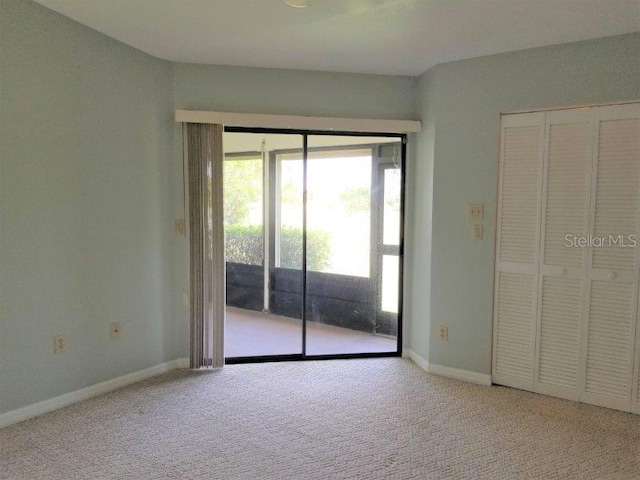 unfurnished bedroom featuring carpet