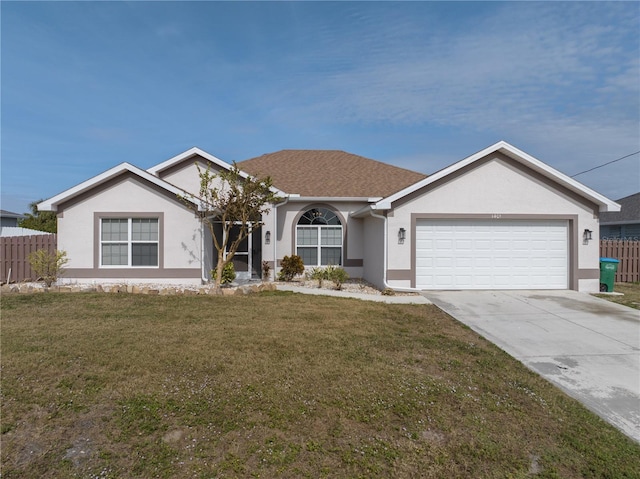 ranch-style home featuring a garage and a front yard