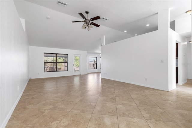 unfurnished living room with ceiling fan, light tile patterned floors, and high vaulted ceiling