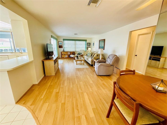 living room featuring light wood-type flooring