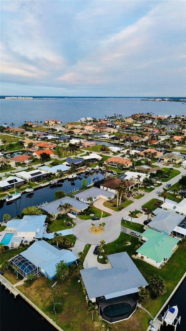 bird's eye view with a water view