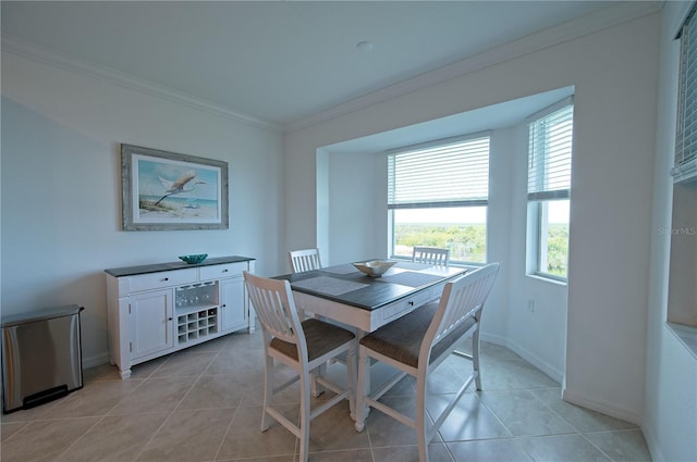 tiled dining area with crown molding